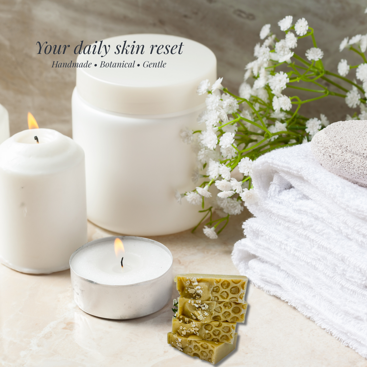 White candles, a towel, and flowers on a surface with 'Your daily skin reset' text.