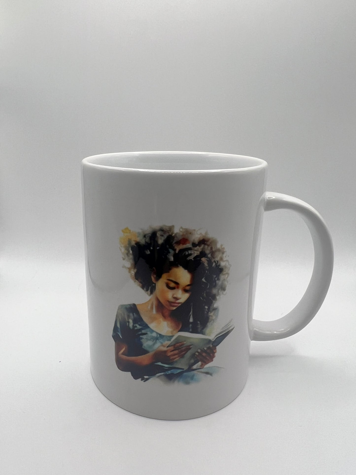White mug with a colorful design of a woman on a white background