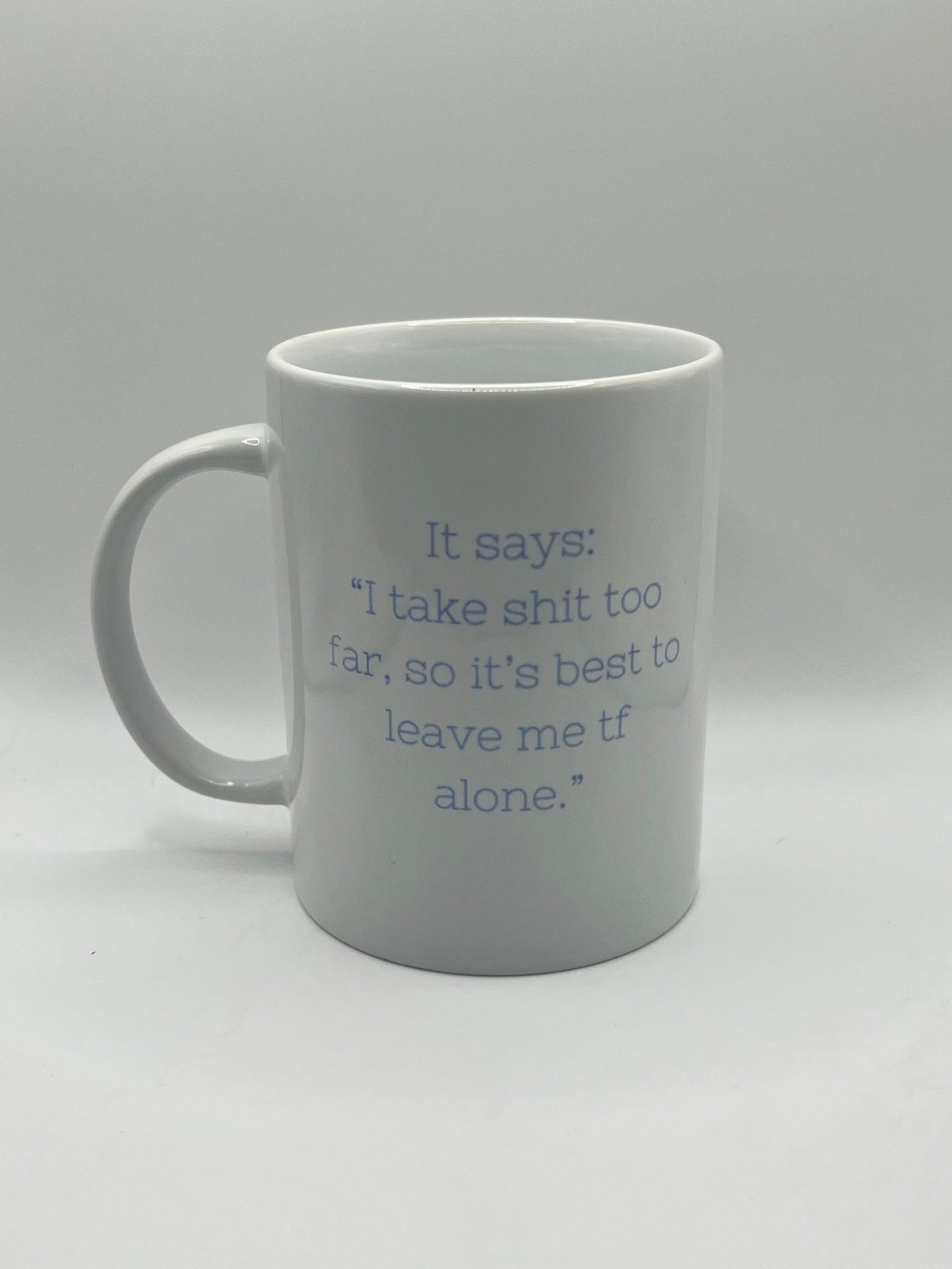 White mug with text on a white background