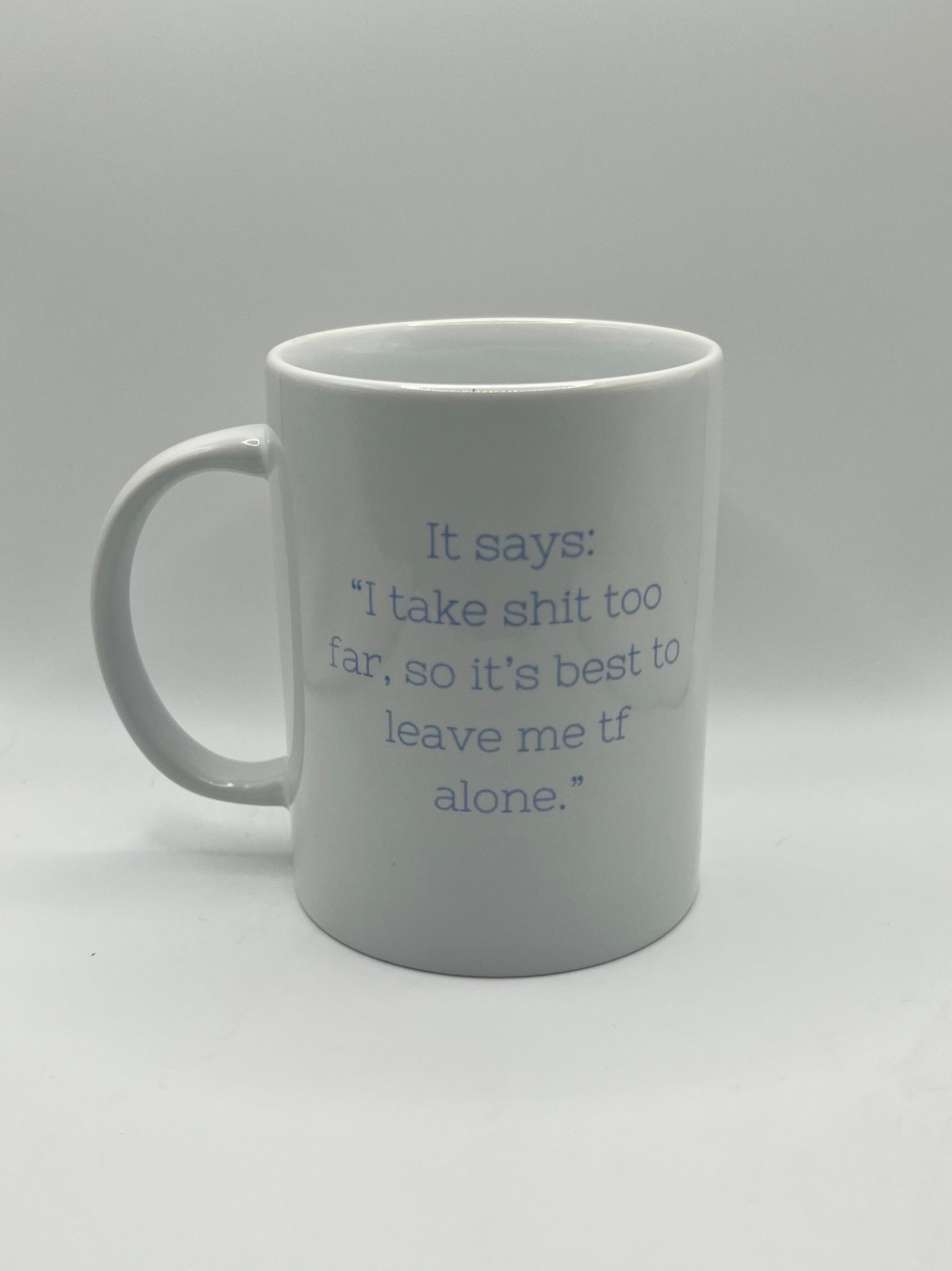 White mug with text on a white background