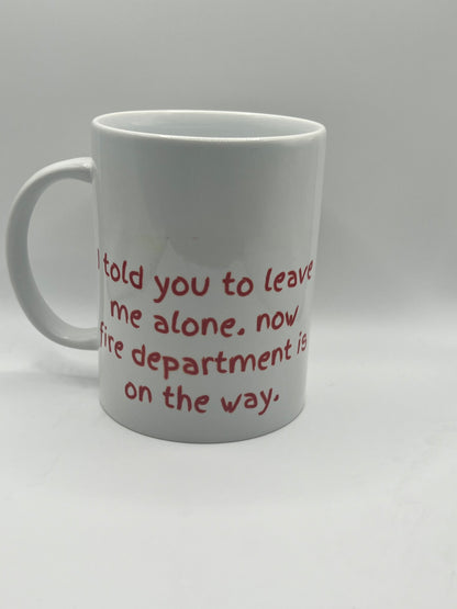 White mug with red text on a white background